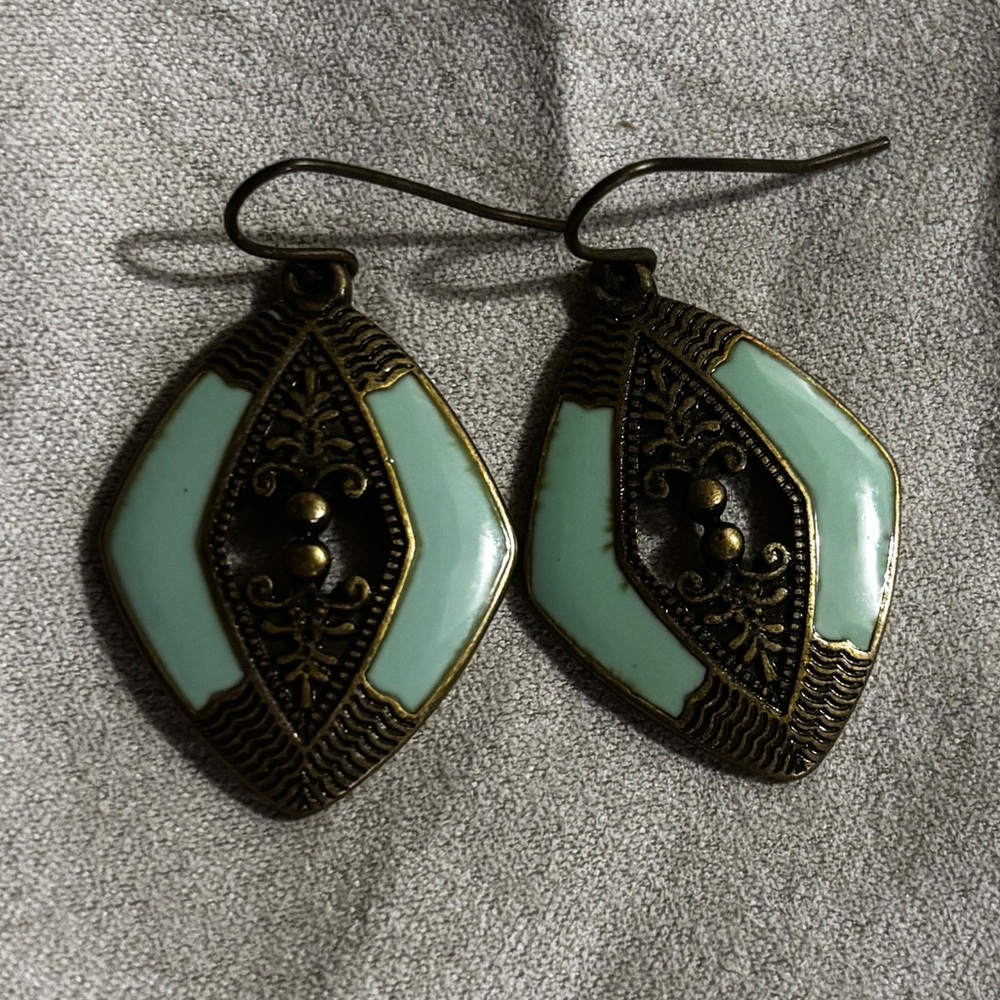 Vintage earrings brass base with a teal accent.